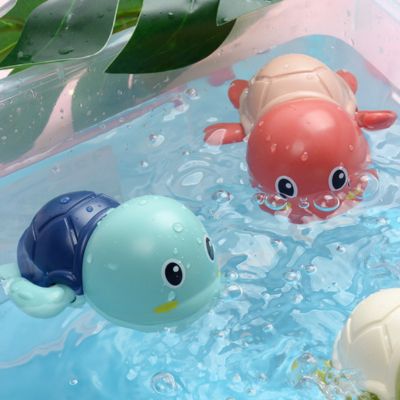 jouet-de-bain-tortue-rose-ludique-pour-bébé