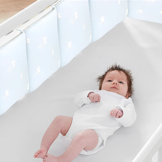 tour-de-lit-bébé-blanc