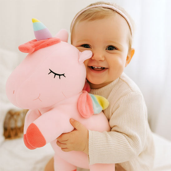 bébé câlin licorne peluche rose