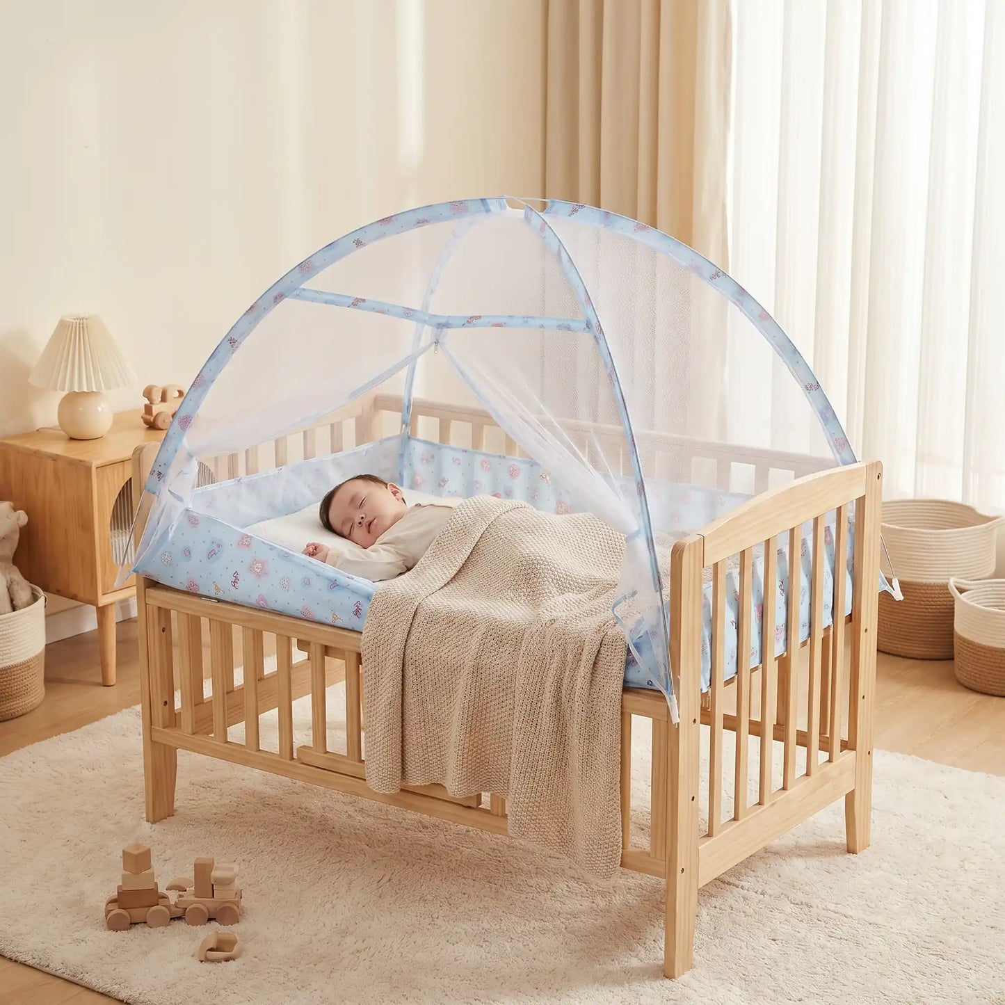 moustiquaire lit bébé bébé dort
