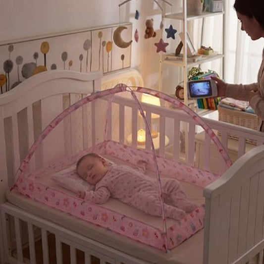 Moustiquaire lit bébé rose dans berceau