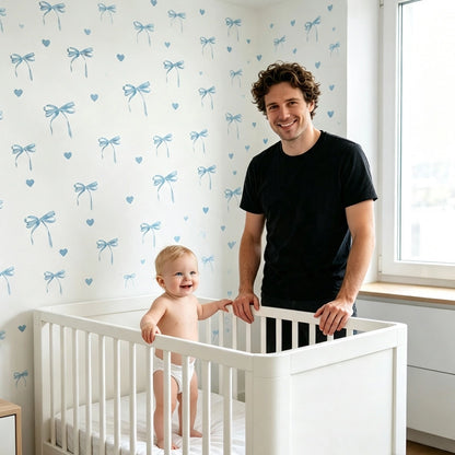 Stickers chambre bébé nœuds et cœurs bleus sur mur blanc