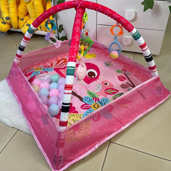 tapis-d-eveil-deux-arceaux-jouets-pendentifs