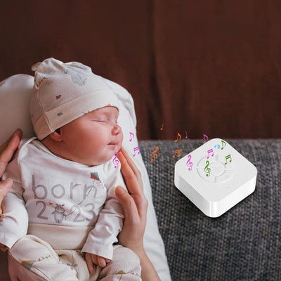 veilleuse bruit blanc bébé dans les bras